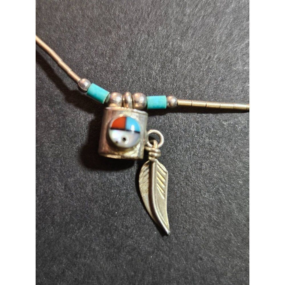 Silver tone and blue feather necklace 16"